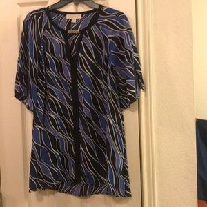 Sheer assorted blues blouse.